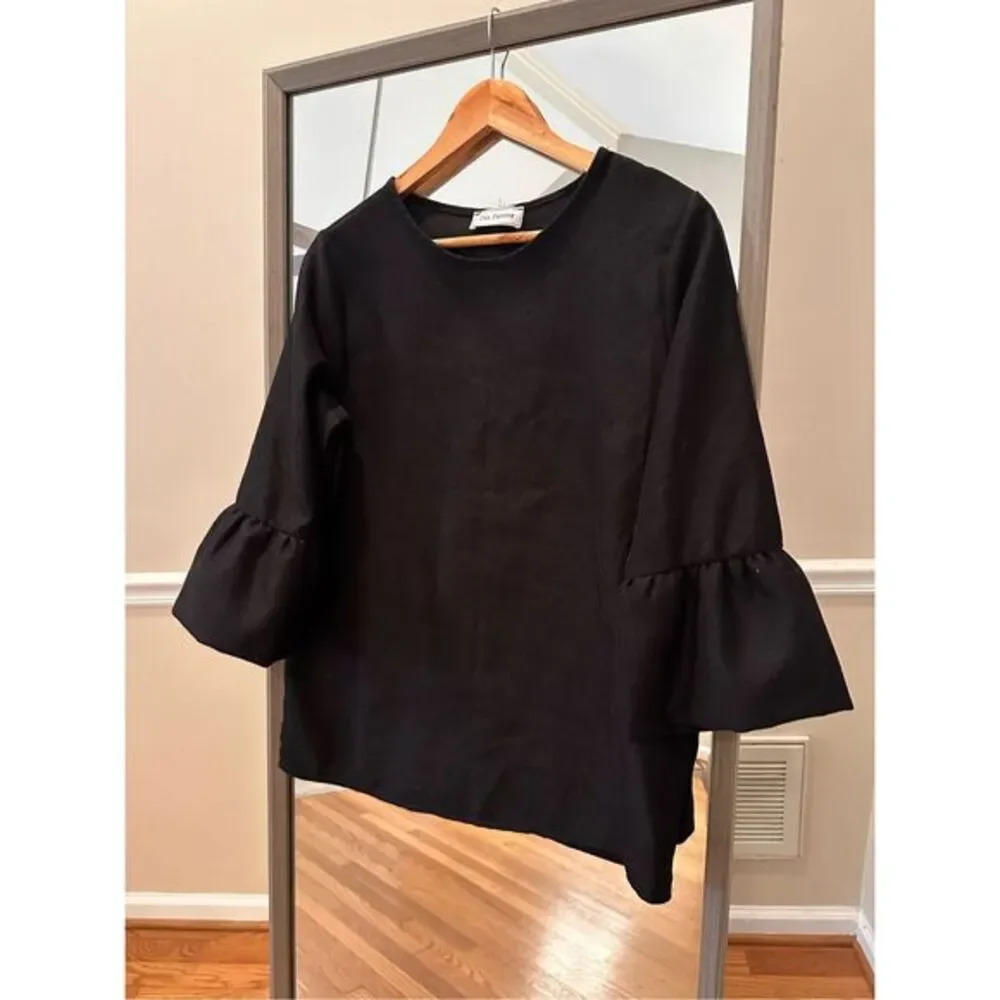 Stylish‎ Ces Femme black top featuring bell sleeves, Size Medium